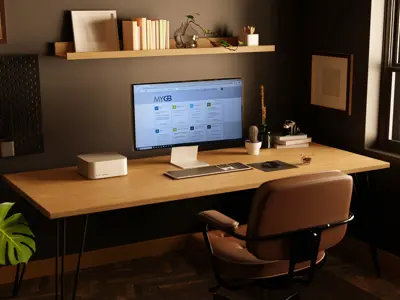 COzy home office with My GB loaded on the laptop screen.