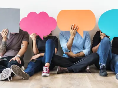 People Carryng Speech Bubble Icons