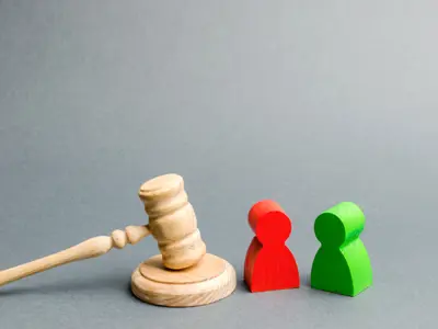 wooden figures and a gavel