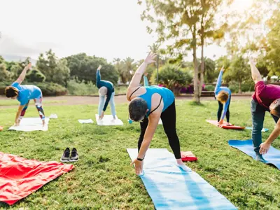 people doing yoga outdoors